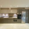 Grey Gloss Kitchen with Quartz Worktops & Siemens Appliances