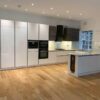 Large White Gloss Modern Handleless Kitchen