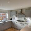 Symphony Light Grey Gloss Kitchen AEG Appliances & Granite Worktops