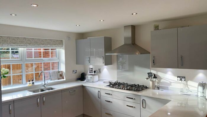 Symphony Light Grey Gloss Kitchen AEG Appliances & Granite Worktops