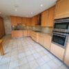 Rational Wood Doors Kitchen with Granite & Appliances