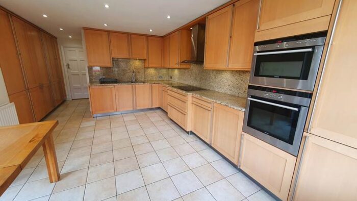 Rational Wood Doors Kitchen with Granite & Appliances