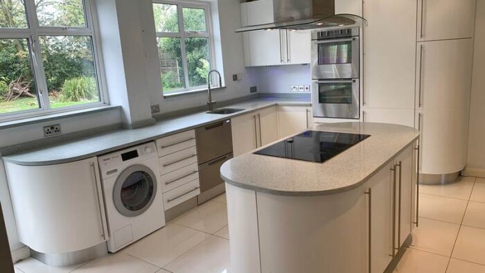 Modern White Matt Satin Rounded Kitchen designed by Marazzi Kitchens