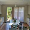 F&B Shaded White Matt Shaker Kitchen with Stone Worktops