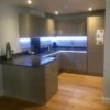 Gloss Cashmere Kitchen with Anthracite Silestone Worktops