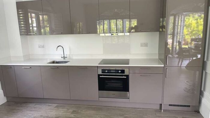 Hacker Grey Gloss Kitchen Quartz Worktops & Appliances