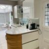 John Ladbury Modern White Gloss & Timber effect Kitchen Granite Worktops