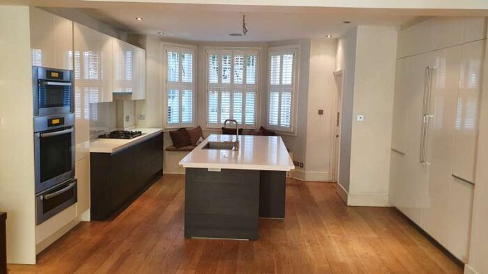 Poggenpohl Cream & Wood Veneer Kitchen + Stone Worktops & Miele & Gaggenau Appliances