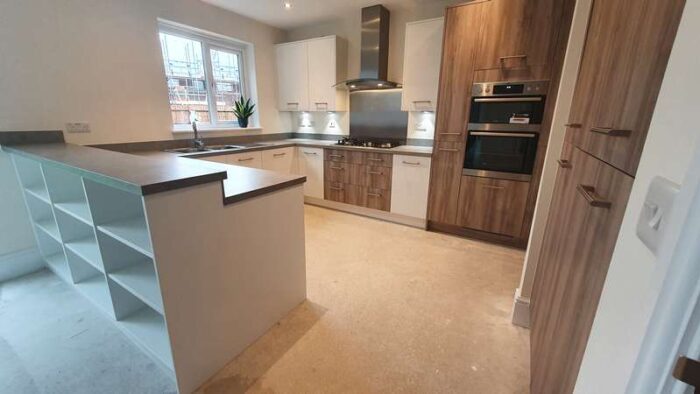 Symphony White & Wood Grain Brushed Chrome Handles Grey Laminate Worktops Appliances