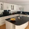 Cream Wood Inframe Shaker kitchen with Granite Worktops & Appliances