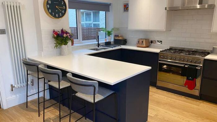 Magnet Matt Midnight Blue Handleless kitchen with Quartz Worktops