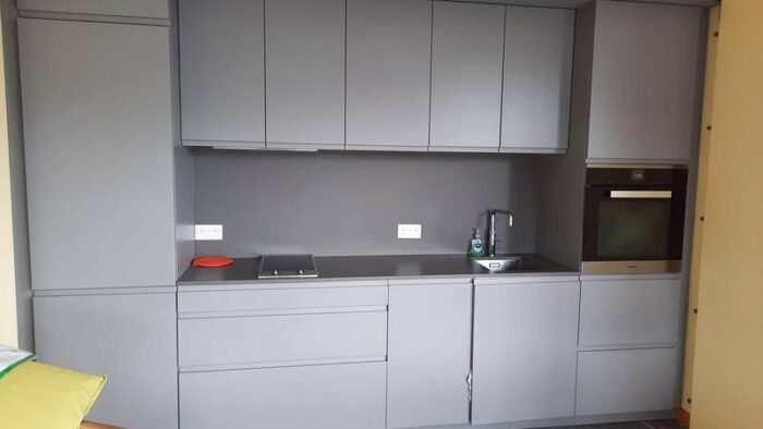 Rational Handleless Matt Grey Kitchen with Silestone Worktops & Miele Appliances