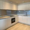 Gloss Buttercream Kitchen with Stone Worktops & Appliances - 3831516