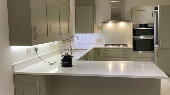 Symphony Grey Shaker Kitchen AEG Appliances Silestone White Worktops