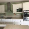 White Shaker Kitchen & Island with Corian Worktops & Neff Appliances