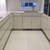 Leicht Gloss White Handleless Kitchen with Quartz Worktops & Siemens Appliances