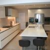 Rotpunkt Gloss Ivory Handleless, Grey Oak Trim Kitchen & Island