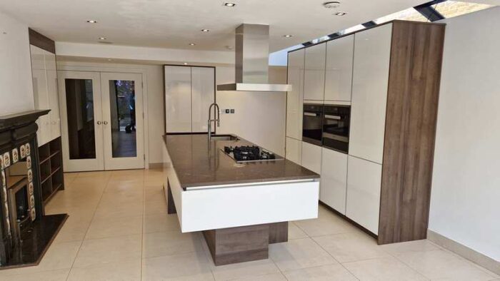 Schmidt Strass Everest White & Wood Effect Melemine Kitchen & Island with Stone Worktops