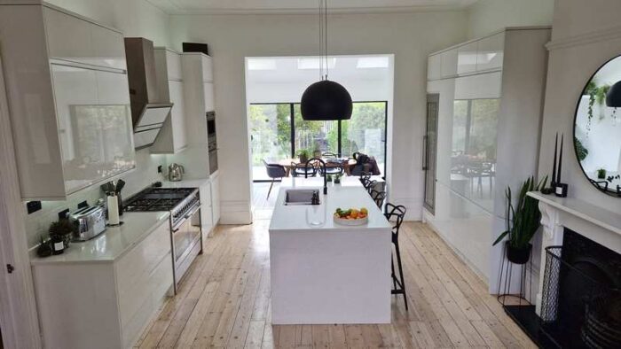 Fabulous White Handleless Kitchen & Island inc Smeg & Miele