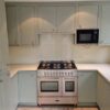 Mereway Light Sage Oak Wood Painted Inframe Shaker Kitchen with Quartz Worktops & Appliances