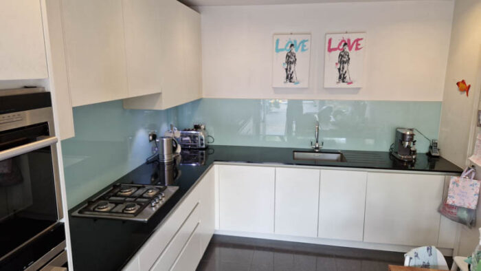 Roundhouse Off White Wood Kitchen with Black Granite & Siemens Appliances 