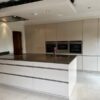 Leicht Latte Gloss Handleless Kitchen & Large Peninsular