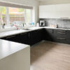 White & Mocha Matt Modern Kitchen + Bosch Appliances Corian Worktops