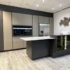 Ex Display Rotpunkt Zerox Black & Zircon Pocket Door Kitchen & Large Peninsular