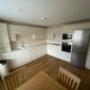 Buttercream Shaker Grain Kitchen Oak effect Carcasses Bosch Neff Appliances Corian Worktops