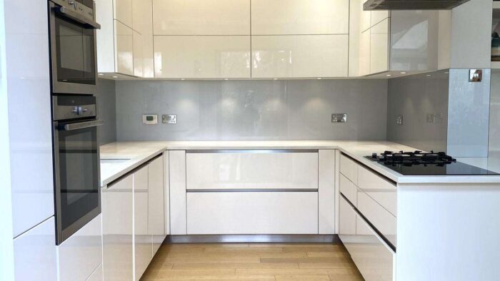 Schmidt Modern White Gloss Handless Neff Airforce Appliances Nearly Blanco White Quartz Worktops