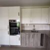 John-Lewis-Modern-Buttercream-Weathered-Oak-Kitchen-AEG-Bosch-John-Lewis-Appliances-Quartz-Worktops