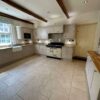 Howdens Modern Tewkesbury Cashmere Kitchen & Dresser – Rangemaster Bosch Appliances – Granite & Oak Worktops