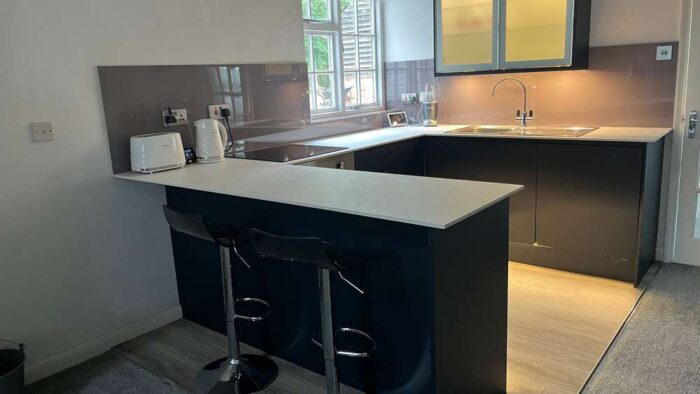 Under 1 Year Old Howdens Navy Modern Kitchen - Lamona Appliances - White Grey Veined Laminate Worktops