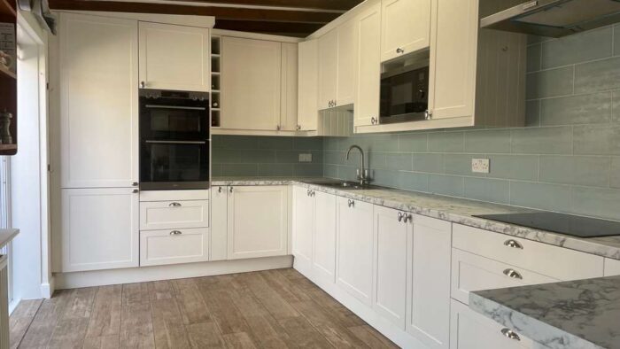 Magnet White Shaker Matt Kitchen – Full set of AEG Appliances – Grey & White Laminate Worktops