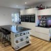 Nicholas Anthony Pronorm Luxury German Chalk White Gloss Kitchen & Matching Island – Siemens Caple Bosch Appliances - Composite Stone Worktops