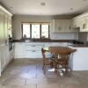 Mackintosh Chamfered Ivory Shaker Traditional Kitchen & Table – Neff Appliances – Granite Worktops