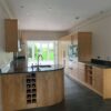 Mowlem & Co Handmade Ripple Sycamore Veneered Door Dovetail Joint Kitchen & Peninsular – Miele Appliances - Granite Worktops