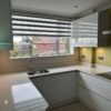 Schuller Crystal White Uni Gloss - Nova Anthracite Matt Kitchen – Neff John Lewis Zanussi Appliances – Quartz Worktops