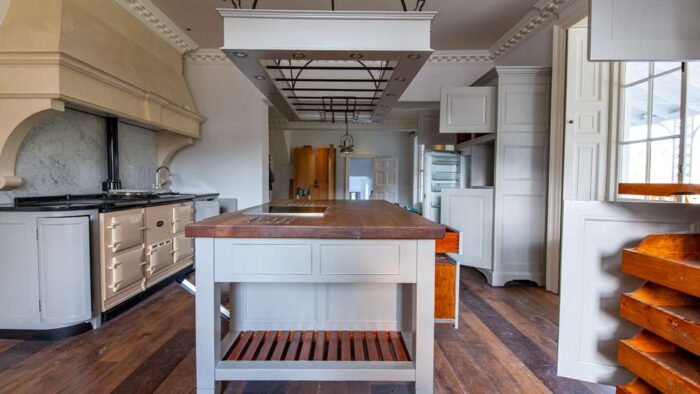 Traditional Hand painted French Light Grey Stained Timber Kitchen & Large Oak Island with Feature Hanging Black Iron Pan Rack & 2 Butler Pantries