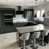 1 Year Howdens Clerkenwell Charcoal Gloss Kitchen – Lamona Hot Point Appliances – Grey Quartz Worktops