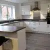 White Gloss Modern Symphony Kitchen & Peninsular – Zanussi Appliances