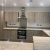 Symphony Modern Virginia Riviera kitchen & Peninsular – Zanussi Electrolux Apppliances – Laminate Worktops