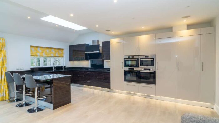 Bespoke Modern Two Tone Buttercream - Walnut Wood effect Gloss Kitchen & Peninsular – Liebherr Bosch Appliances – Granite Worktops