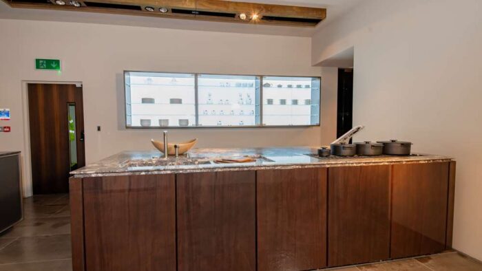 Ex Display Rossana Italian Luxury Olive Large Island & Glass Wall Units – Barazza Gaggenau Appliances - Marmo Breche Nouvelle Marble Worktops & Sink