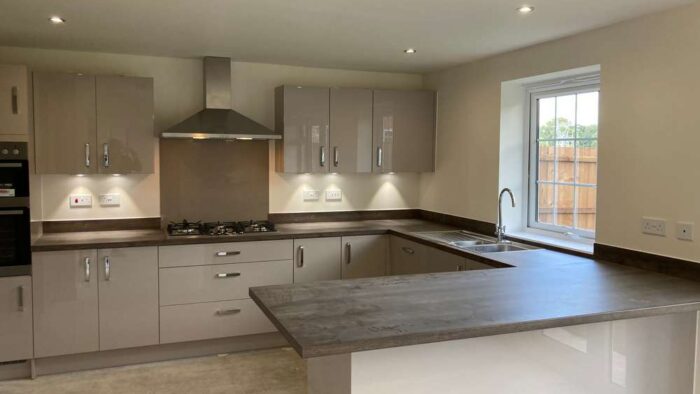 Symphony Modern Cappuccino Gloss Kitchen & Peninsular – AEG Appliances - Wood effect Laminate Worktops