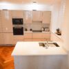 Paula Rosa Manhattan Cashmere Grey Gloss Kitchen & Peninsular – Select Bosch Fisher & Paykel Appliances – Granite Worktops