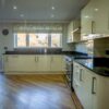 Large Buttercream Kitchen and Matching Utility Room – Bosch Stones Appliances