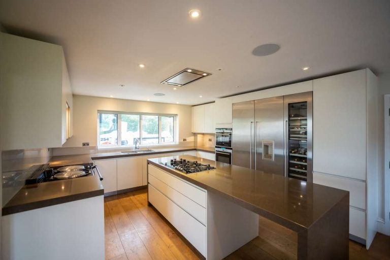 Quality Used Kitchens For Sale Used Kitchen Hub   Luxury Modern Handleless White Nicholas Anthony Kitchen Island Matching Utility Room – Gaggenau Siemens Appliances – Granite Worktops With Waterfall Sides 00006 768x512 