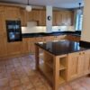 Modern 4 Year Shaker Wood Knotted Kitchen & Matching Island – Neff Appliances – Black Granite Worktops