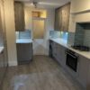 Cooke and Lewis Grey Shaker Kitchen – White Quartz Worktops